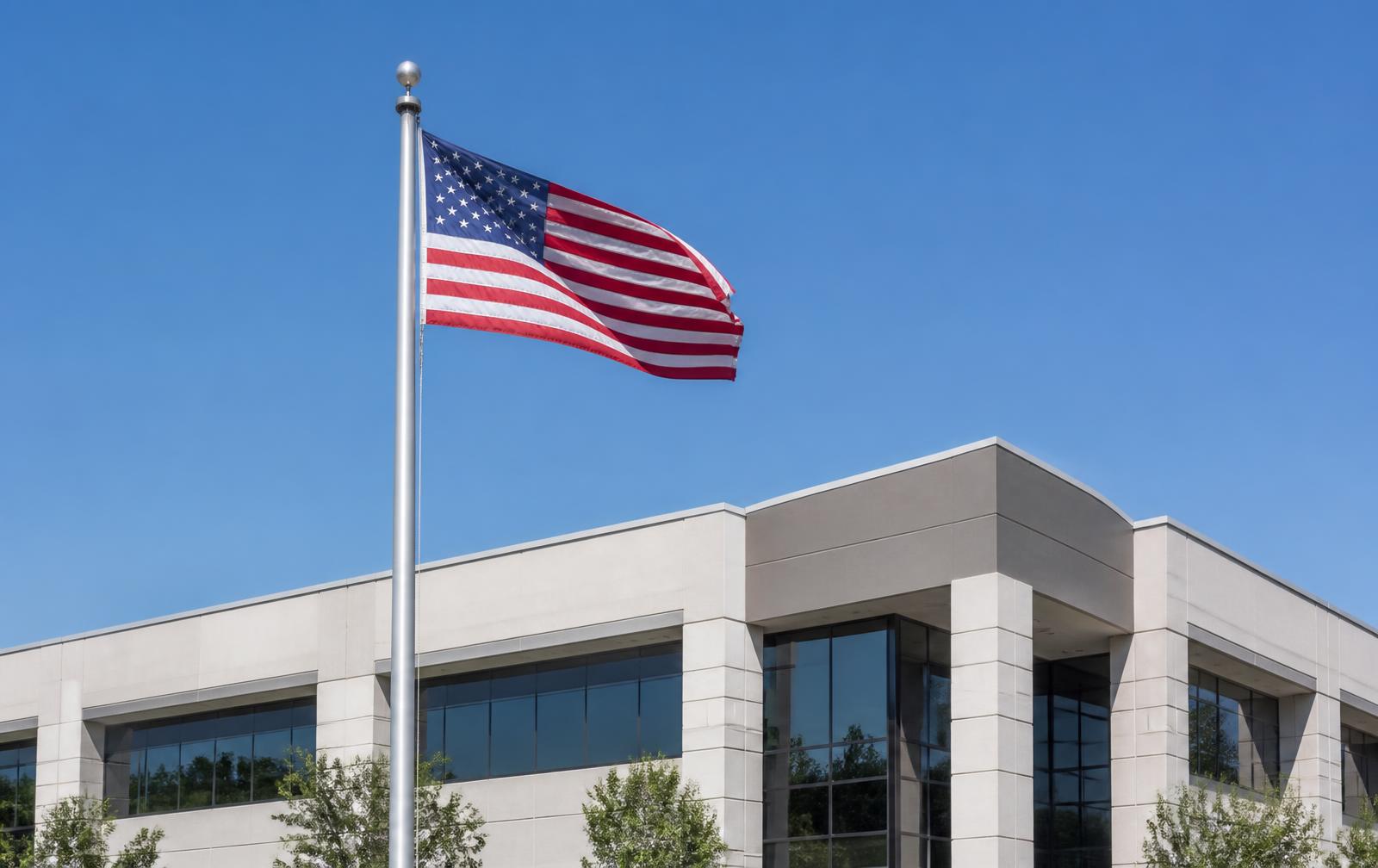 American flag in front of a U.S. office building